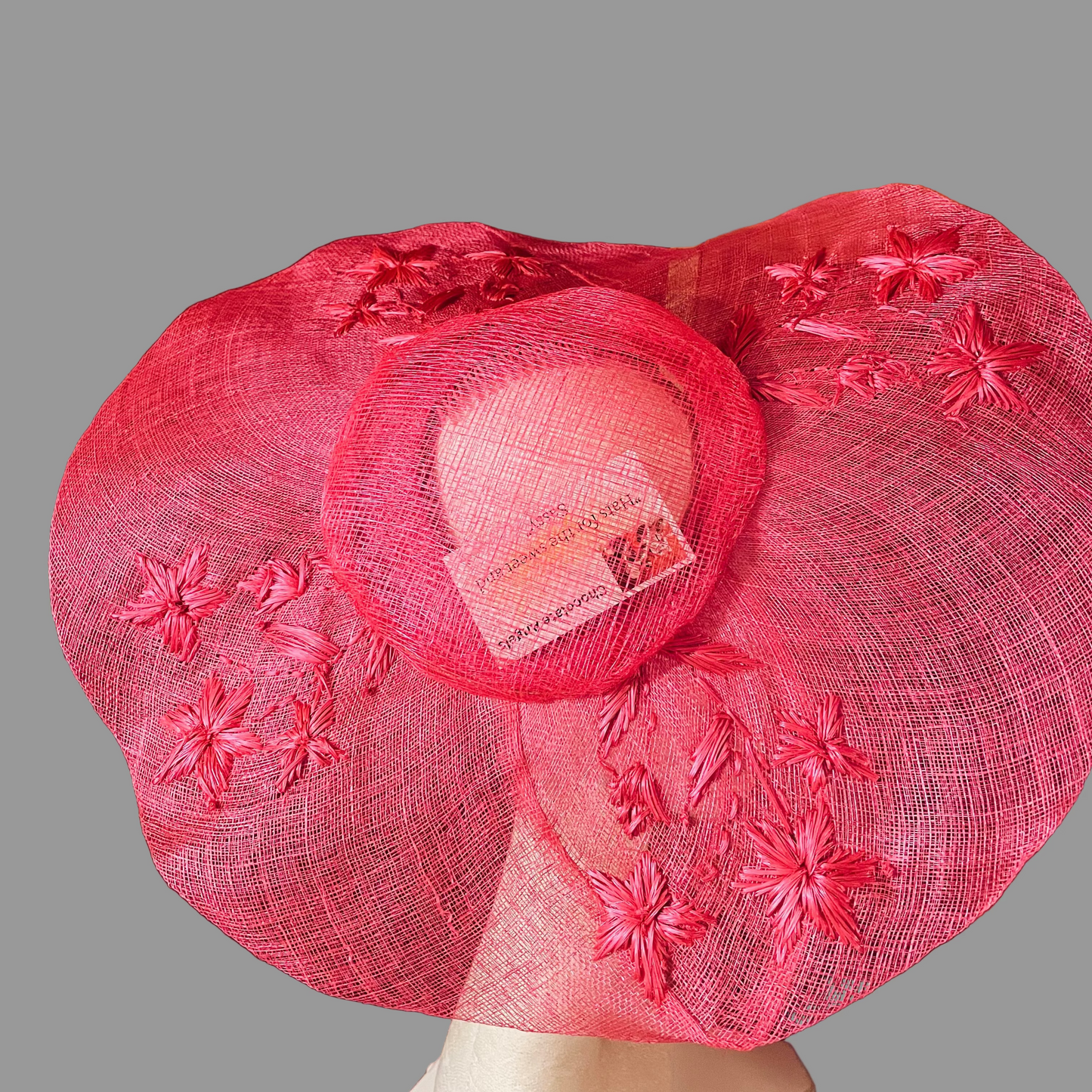 pink embroidered sinamay fasinator