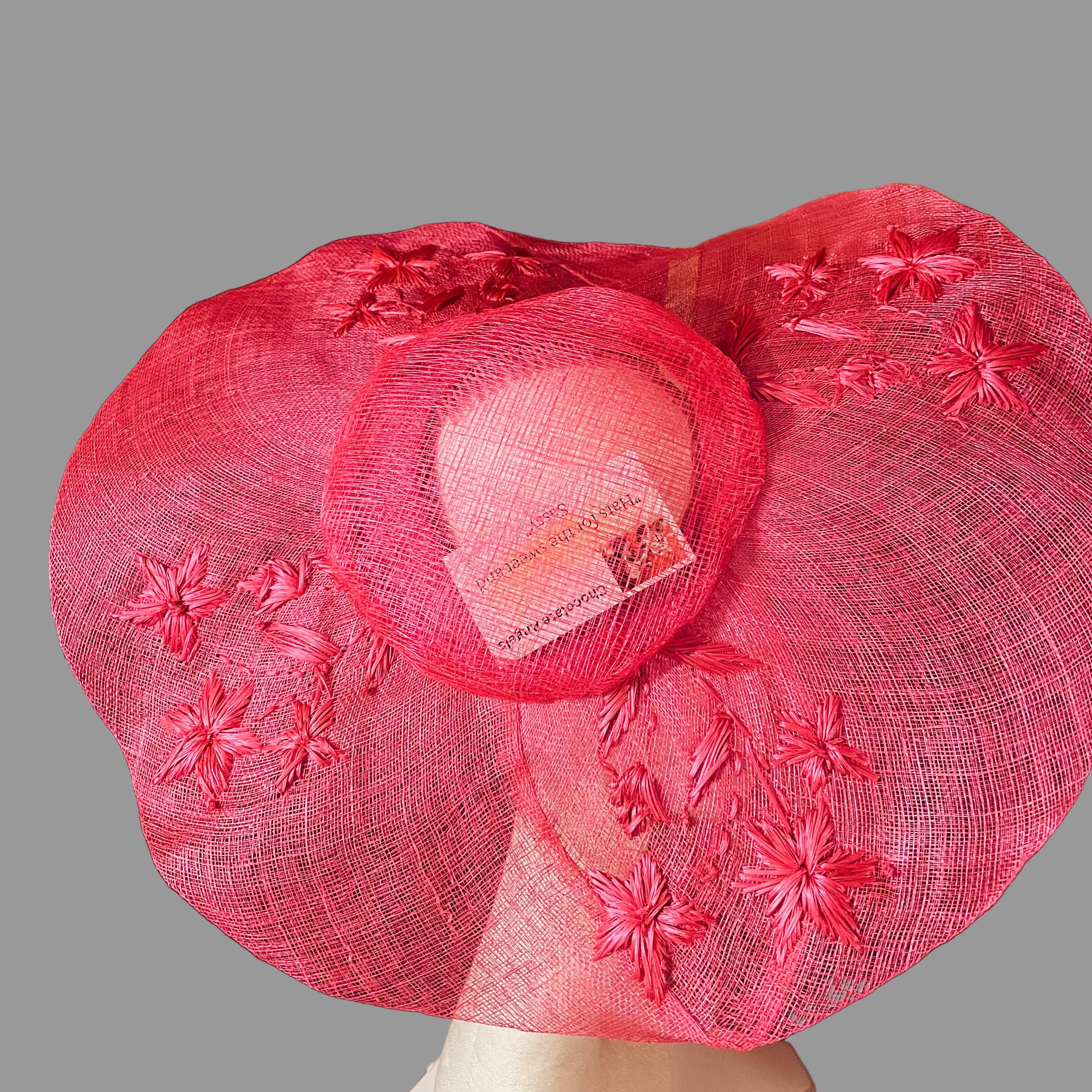 pink embroidered sinamay fasinator
